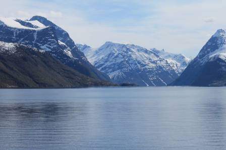 Sandy Yet Snowy: Beaches Next to Snow-Capped Mountains